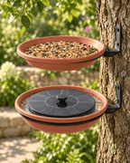 Illustrative wall-mounted bird bath and separate solar fountain; not to scale